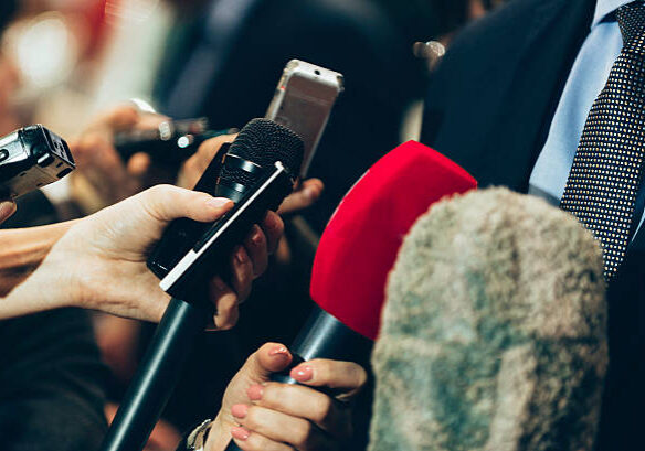 Interviewing business man on press conference